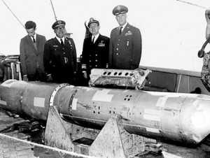 NUCLEAR: Officials display a recovered bomb after the 1966 Palomares accident