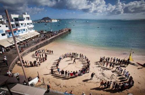 EXPLORATION: Over 200 people created a human S.O.S to protest against oil drilling off the Canary Islands